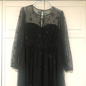 Torrid black dress, knee length, with long sleeves. Brand new.